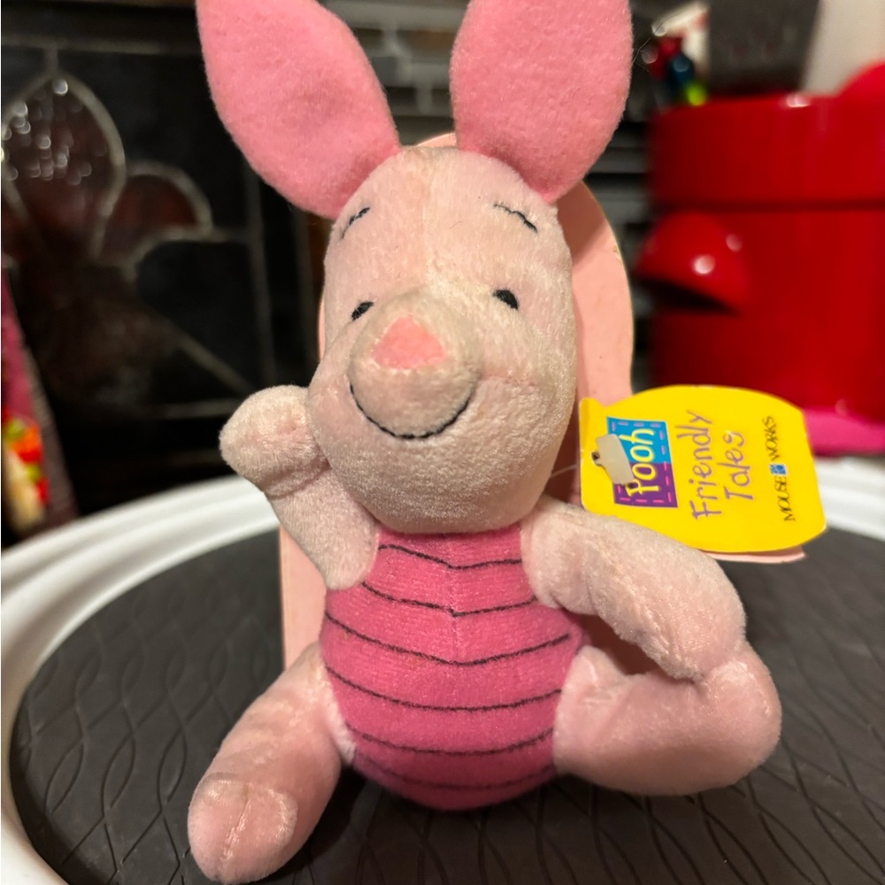 Vintage 1997 Disney Piglet Plush w/attached little book.